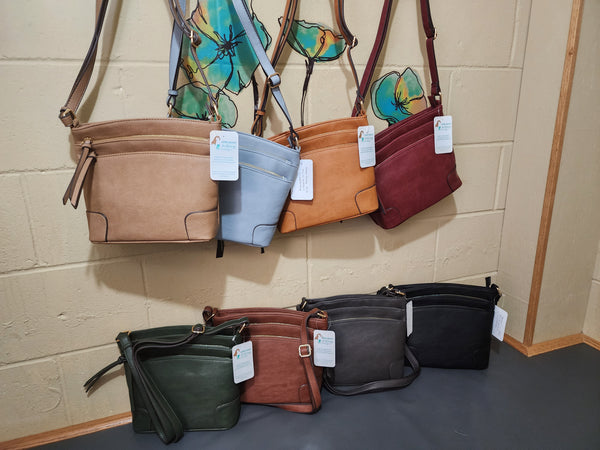 Multi pocket crossbody bags