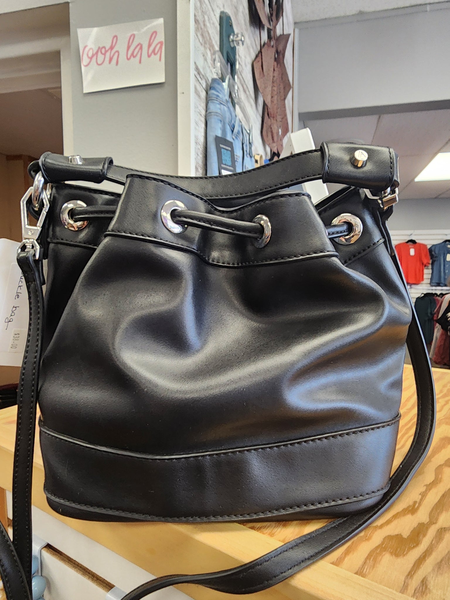 Buckle front bucket bag
